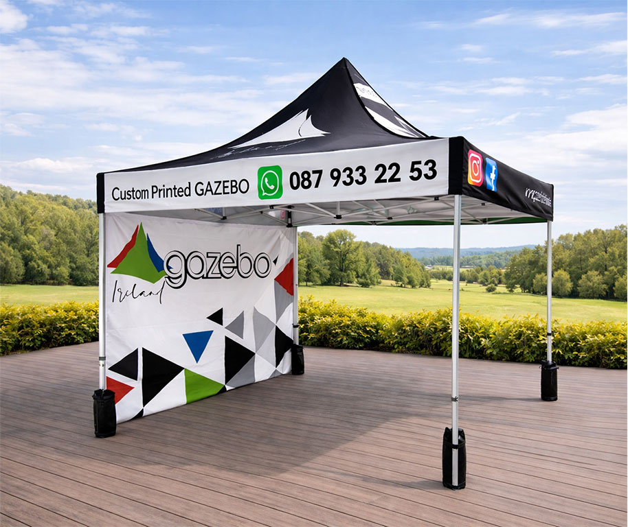 Models sitting back to back, wearing Basic Tee in black and bone.